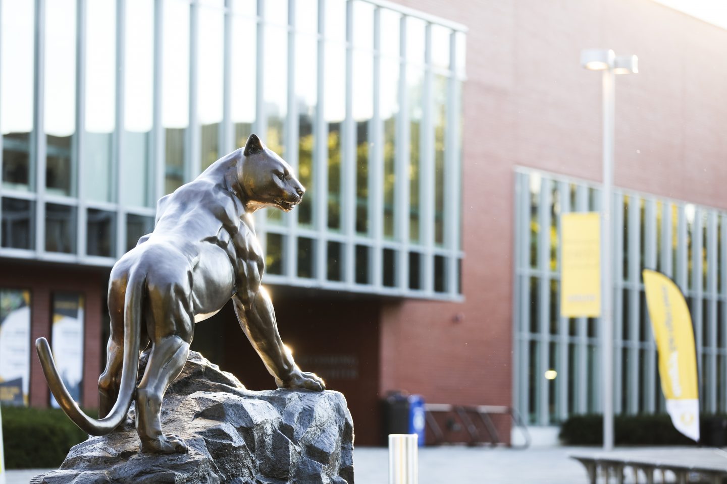 The bronze statue of ӰƬ' Panther mascot in front of the Center for Recreation and Sports